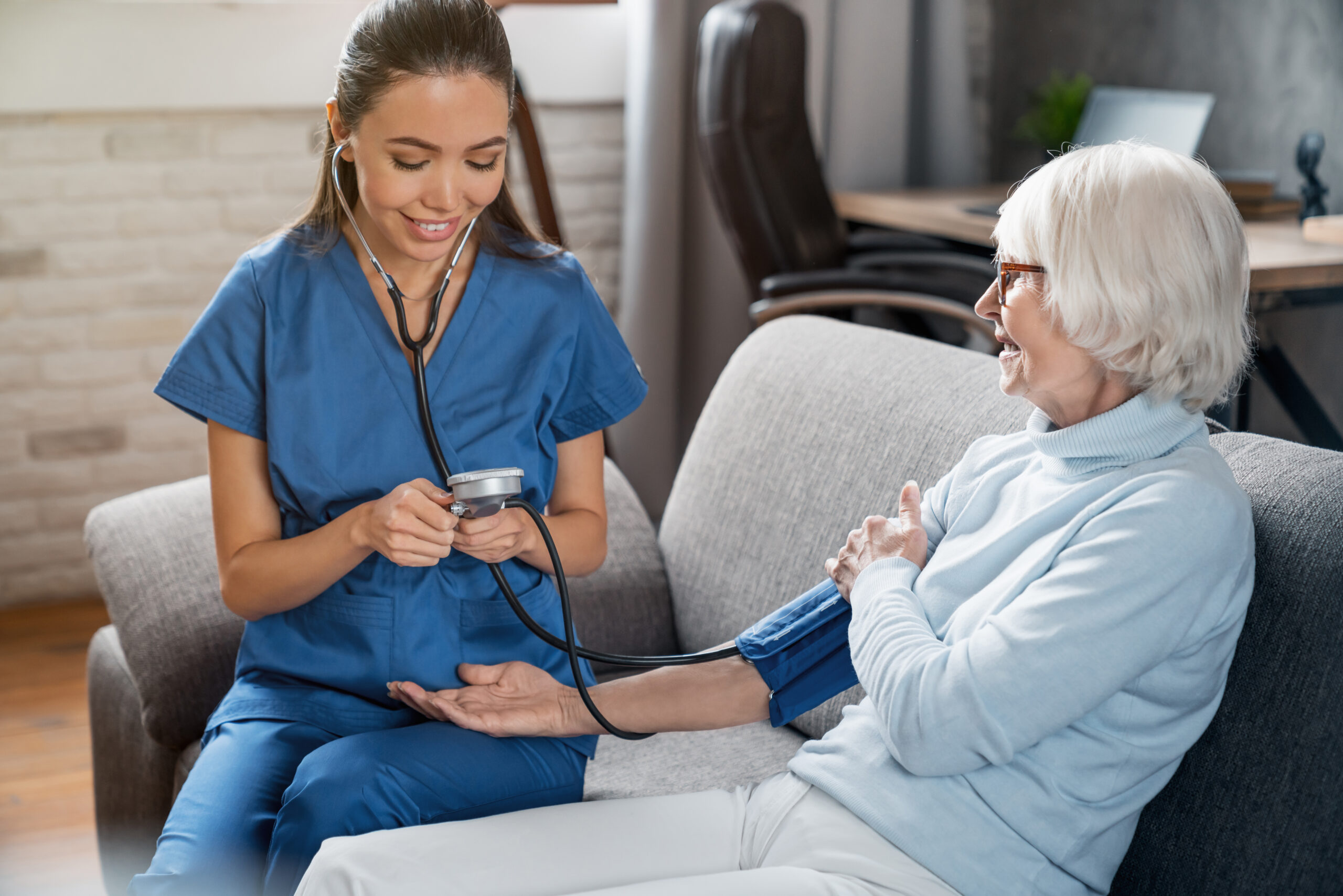 Nurse Doing Blood Pressure Check Service in Southeast Michigan, Northwest Ohio, and South Florida